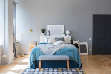 elegant creative modern trendy interior of a spacious open plan Scandinavian style studio with seating and sleeping areas