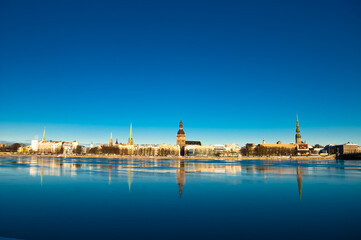 Fototapeta premium riga. in the photo, a panorama of the city against the blue sky