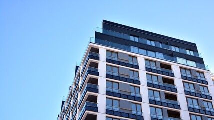 Modern apartment building in sunny day. Exterior, residential house facade.