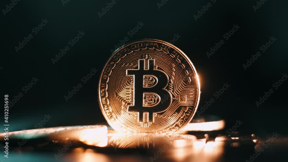 Poster bitcoin. crypto currency gold bitcoin btc. macro shot of bitcoin coins isolated on black background 