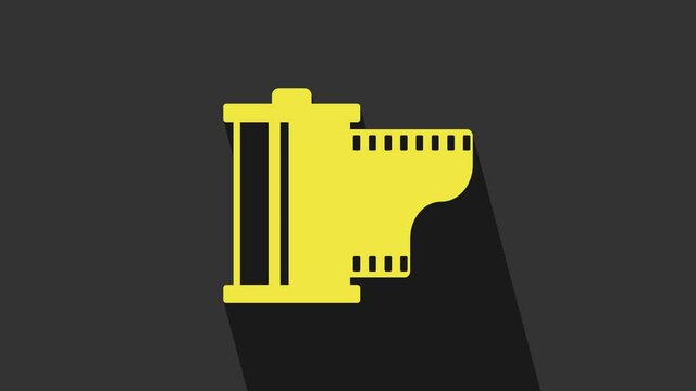 Yellow Camera vintage film roll cartridge icon isolated on grey background. Film reel. 35mm film canister. Filmstrip photographer. 4K Video motion graphic animation