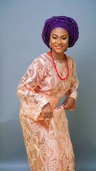 Portrait of happy Nigerian woman dressed in Traditional attire 