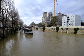 Notre Dame de Paris during the Seine river in flood. 1st February 2021.
