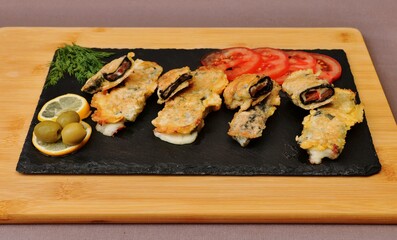 vegetarian dish cheese sticks on a black plate healthy food