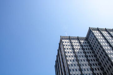 Powerful image of an office skyscraper with a clear sky