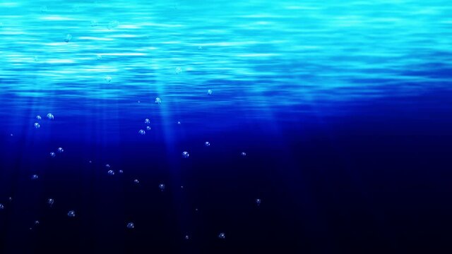 Bubbles underwater rising to water surface. Blue ocean illuminated the bright rays. Water bubbles in the sea. Loop animation.