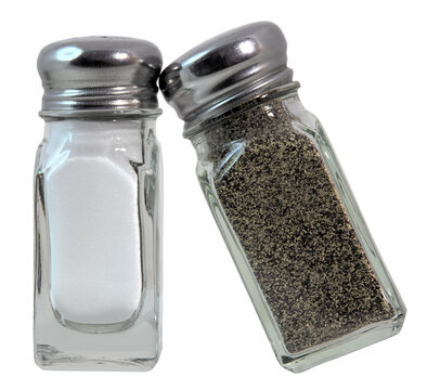 Isolated Glass Salt And Pepper Shakers.