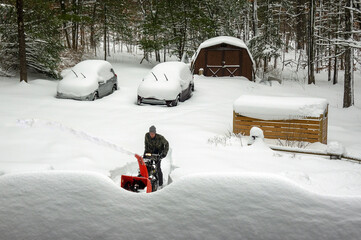 man with snow blower