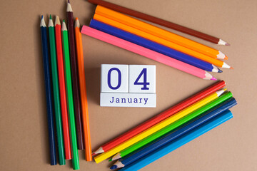 January 4 on the wooden calendar.The fourth day of the winter month, a calendar for the workplace....
