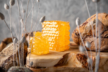 Honey comb. A useful fortified bee product for health and beauty. Vegetarian dietary organic...