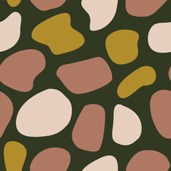 Seamless abstract pattern with rounded shapes on a dark background.
