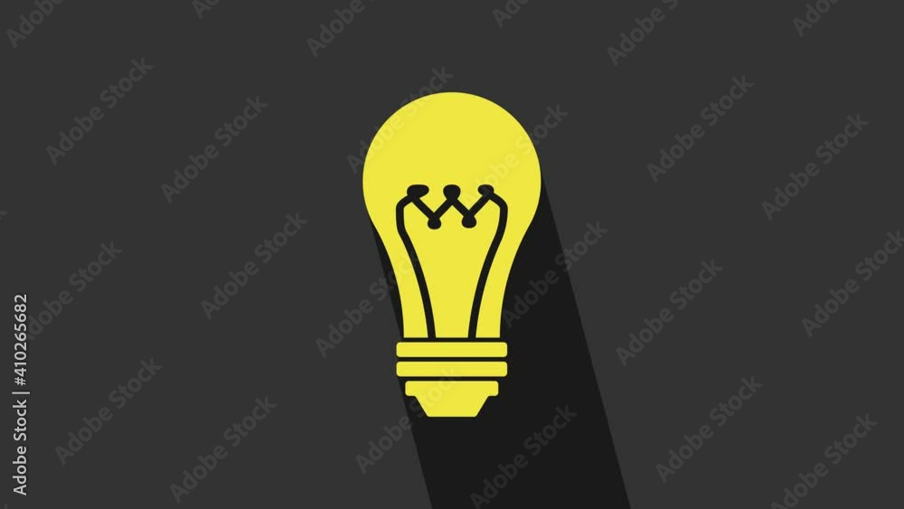 Sticker Yellow Light bulb icon isolated on grey background. Energy and idea symbol. Lamp electric. 4K Video motion graphic animation