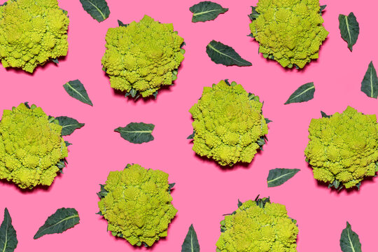 Pattern of Romanesco cauliflowers against pink background