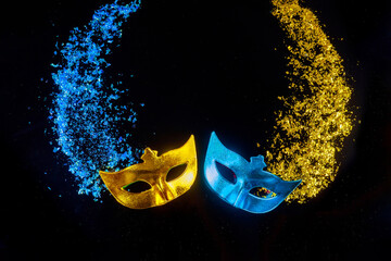 Carnival masks on black background. Jewish Purim.