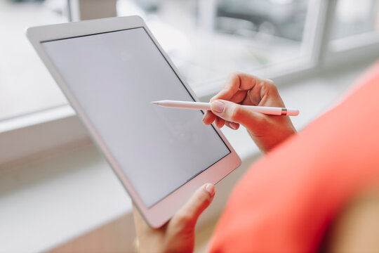 Businesswoman using digital tablet in office