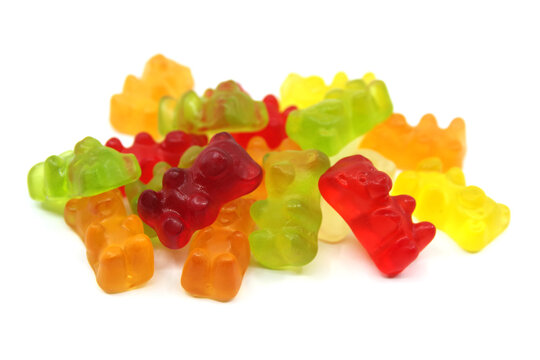Colourful gummy bears candies isolated on white background. Fun candy macro shot