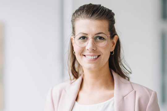 Portrait of smiling businesswoman in office