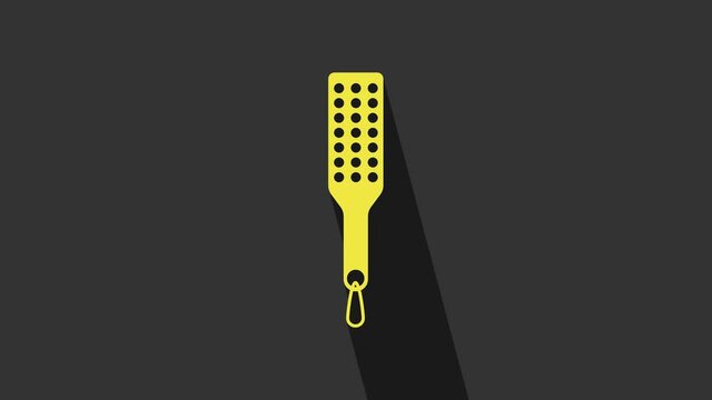 Yellow Spanking paddle icon isolated on grey background. Fetish accessory. Sex toy for adult. 4K Video motion graphic animation