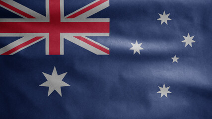 Australian flag waving in the wind. Close up of Australia banner blowing silk.