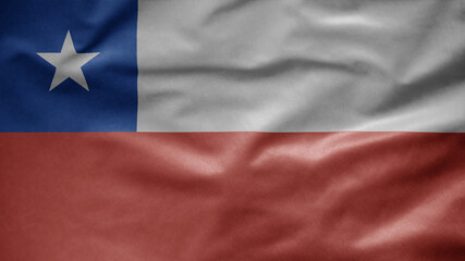 Chilean flag waving in the wind. Close up of Chile banner blowing, soft silk.