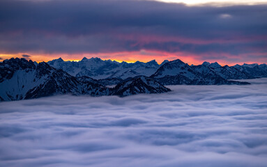 Alps mountain panorama after sunrise foggy mountain, mist fog nature landscapes.