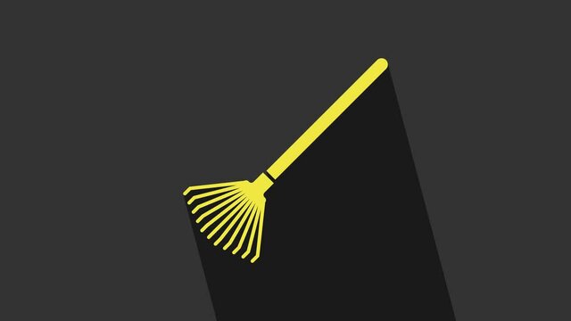 Yellow Garden rake for leaves icon isolated on grey background. Tool for horticulture, agriculture, farming. Ground cultivator. 4K Video motion graphic animation