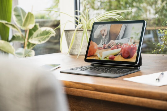 Food tutorial video playing on digital tablet at home