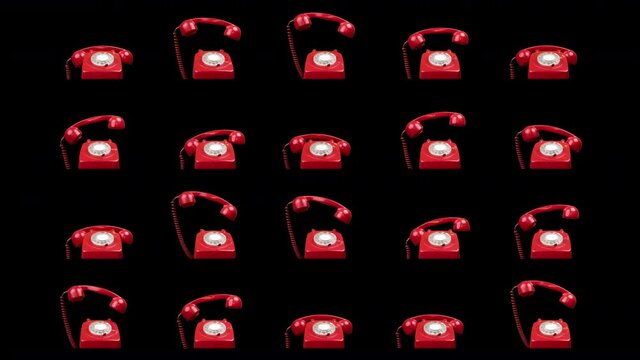 Red classic rotary telephones stop motion