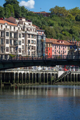 view of the old town of Bilbao from the estuary on a sunny day with blue sky, Bilbao, Bizkaia, Basque Country, Spain, Europe