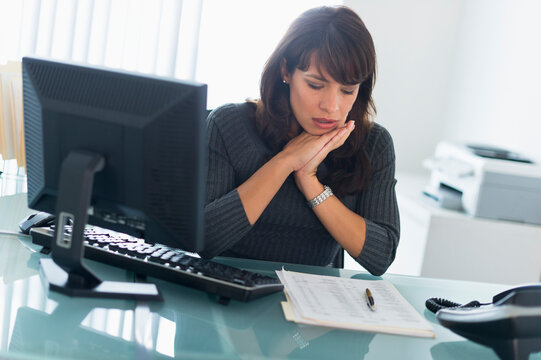 Business Woman Reading Documents