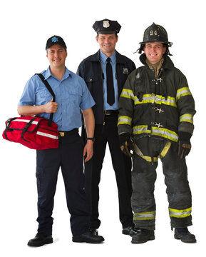 Studio portrait of emergency medical technician, policeman and fireman
