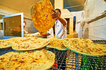 Buy fresh flatbread, Kerman, Iran