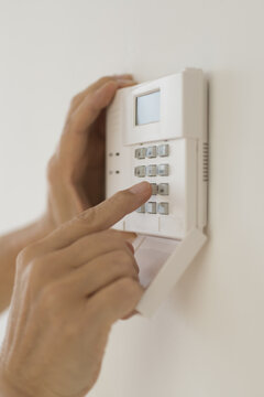 Hand setting code on burglar alarm