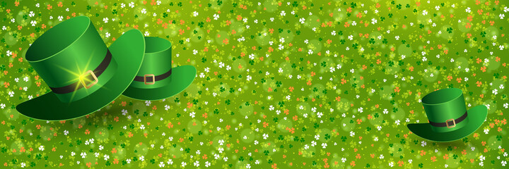 St.Patrick's Day green blurred vector background with colorful clover leaves and leprechaun hat