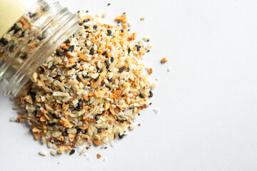 Bagel Seasoning Spilled from a Spice Jar