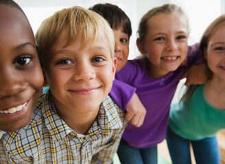 Portrait of smiling school children (8-9)