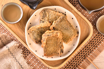 Black glutinous rice cake on the plate