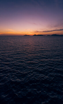 Beautiful sunset, aerial view of the beach, acapulco city seen from above. Travel and vacation concept. Colorful sunset on the beach