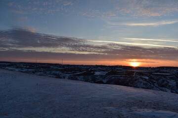 sunset over the winter village