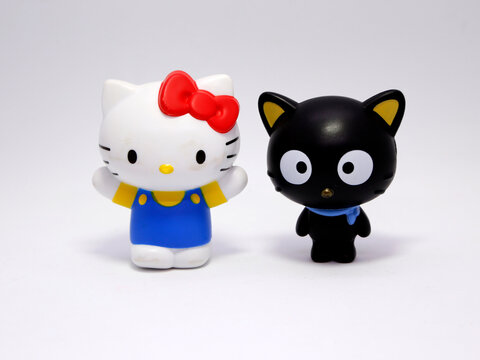 Hello Kitty and Chococat. Hello Kitty and her friends. Famous characters. Adorable kitten. Character from Japan. Black cat.