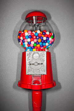 Gumballs in gumball machine, studio shot