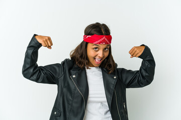 Young latin rocker woman isolated on white background