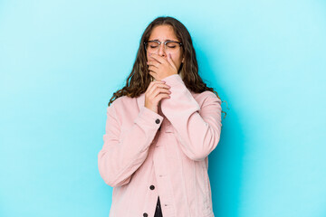 Young caucasian curly hair woman isolated suffers pain in throat due a virus or infection.