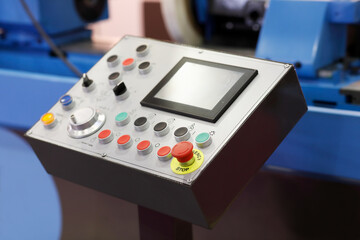 control panel of industrial equipment with touchscreen