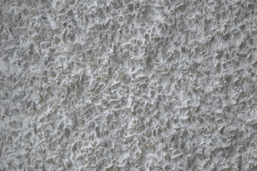 decorative coating with fine stone abrasive, light background