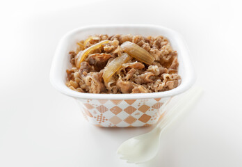 Close-up of beef bowl (Gyudon)  in plastic container for takeout