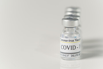 Covid-19 vaccine concept. vaccine in small glass ampoules