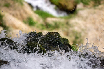 water flowing from the rocks