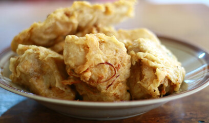 Fried Tofu (Tahu Isi Goreng) on a plate. Indonesian traditional food.