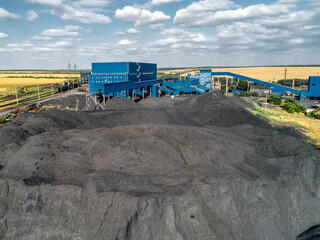 Dump of coal. A high pile, aerial view.